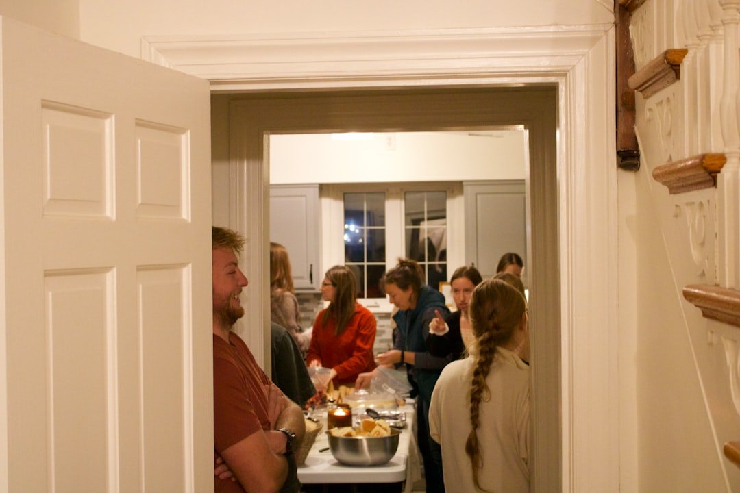 People gathered in a kitchen during a party