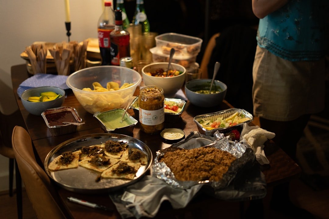 A table laden with various dishes and drinks